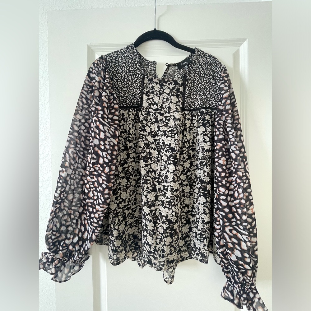 Cute top! Only worn one time